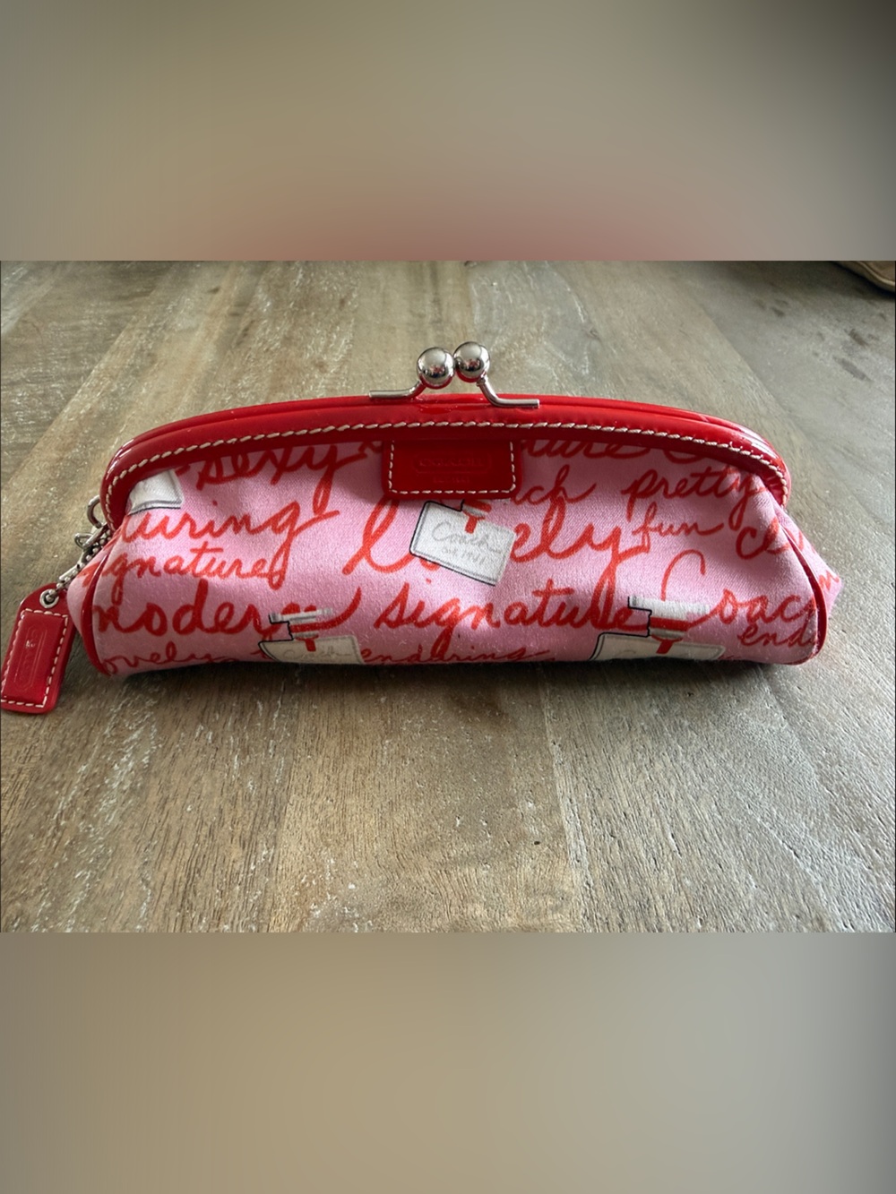 Coach Pink Signature Script Kiss-Lock Cosmetic Pouch with Red Trim